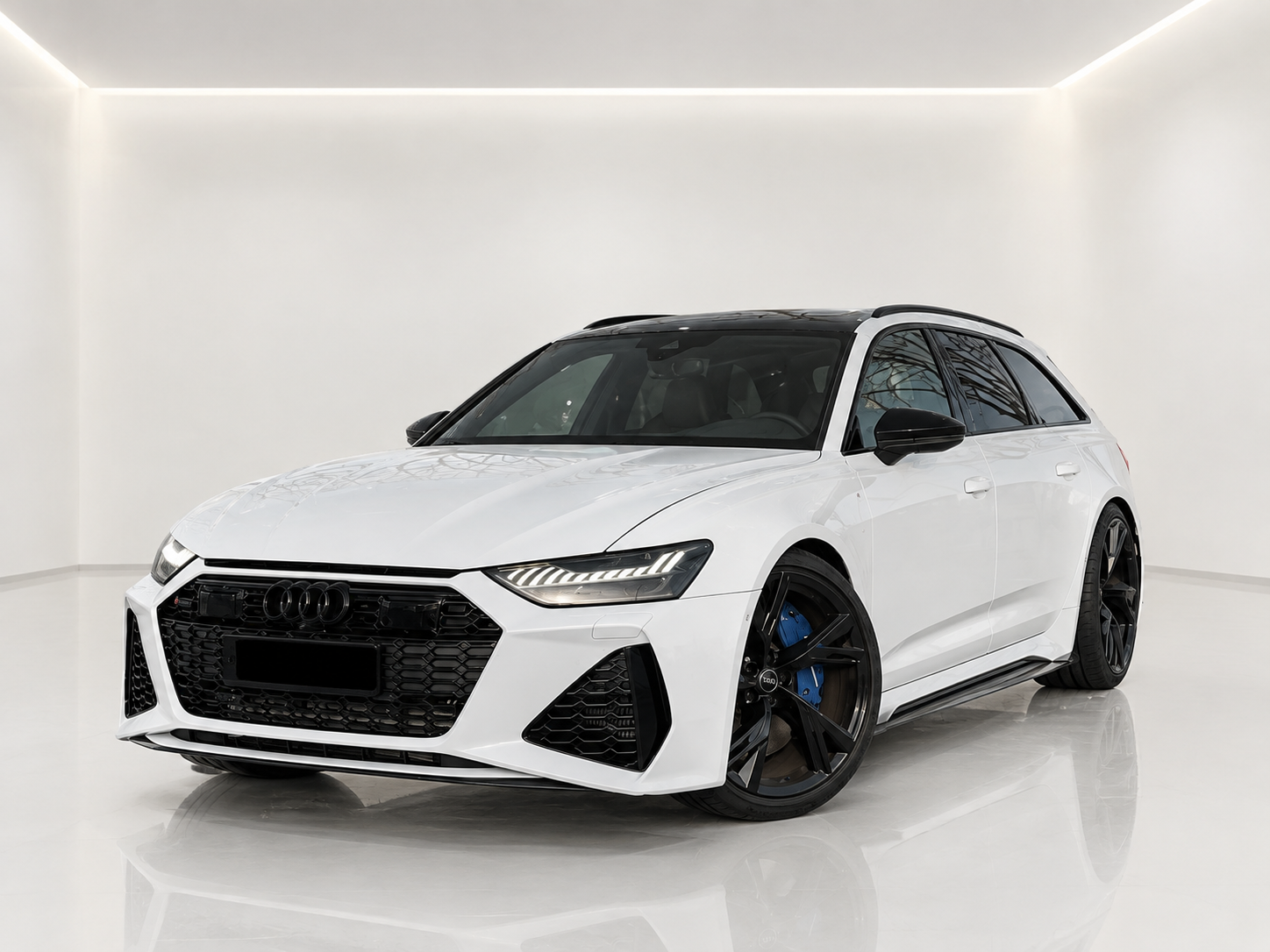 Audi RS6 Avant 2024 in alpine white huren bij MalaCars Nederland